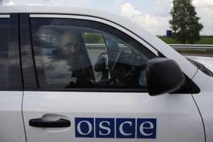 OSCE observer Axel Schneider sits in a car on a road 30 km (19 miles) from Donetsk after being freed by pro-Russian separatists
